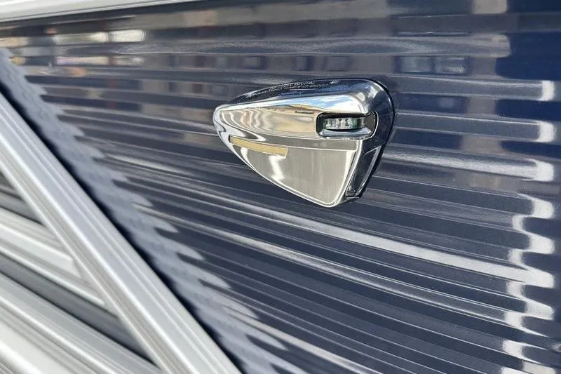 Slide: The Image of 2026 Bennington 22 SF boat interior with seating and control panel. - 11