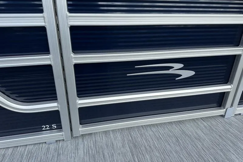 Slide: The Image of Close-up of 2026 Bennington 22 SF boat's sleek metallic detail. - 12