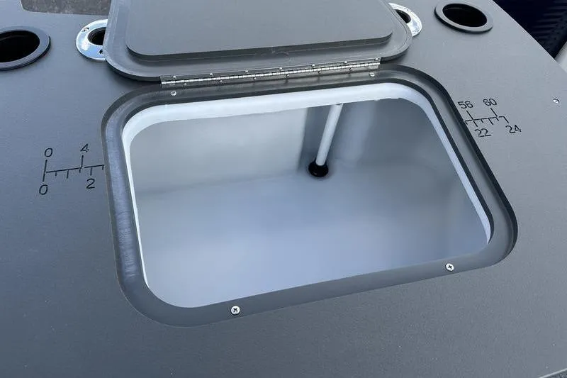 Slide: The Image of 2026 Bennington 22 SF boat interior with sleek design and storage compartment. - 15