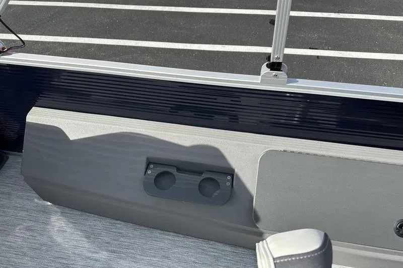 Slide: The Image of 2026 Bennington 22 SF boat interior with cup holders and seating. - 20