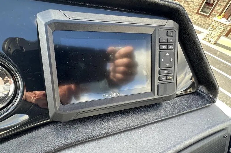 Slide: The Image of Storage compartment with tackle boxes in a 2026 Bennington 22 SF boat. - 23