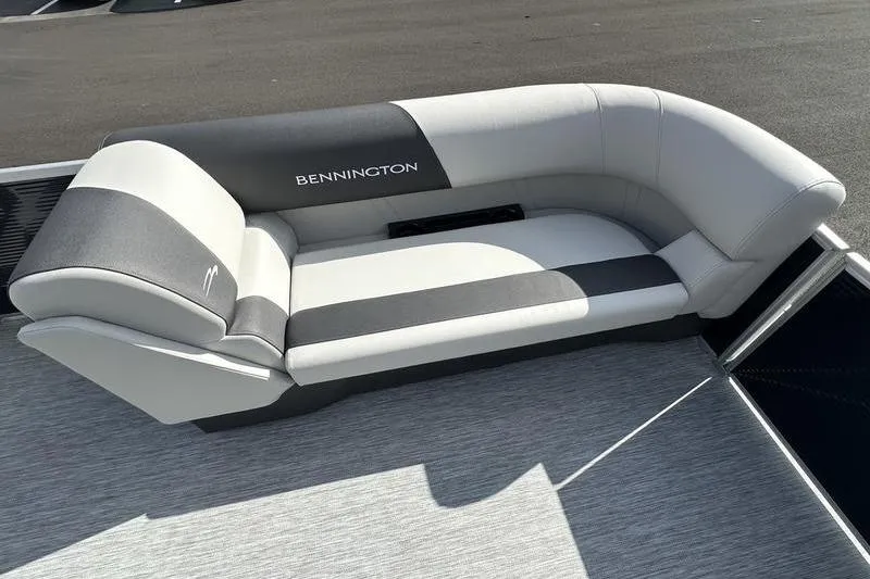 Slide: The Image of 2026 Bennington 22 SF boat seat with logo and cup holders. - 35