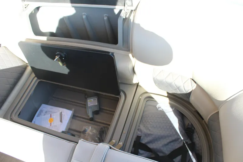 Slide: The Image of Storage compartment in 2023 Sun Tracker Party Barge 22 RF DLX pontoon boat. - 16