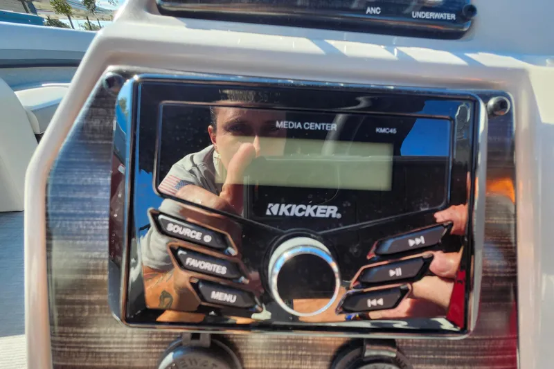 Slide: The Image of Kicker media center on 2026 Lowe SS 230 DV boat dashboard. - 21