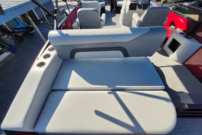 Slide: The Image of 2026 Lowe SS 230 DV boat interior with plush seating and modern design. - 25