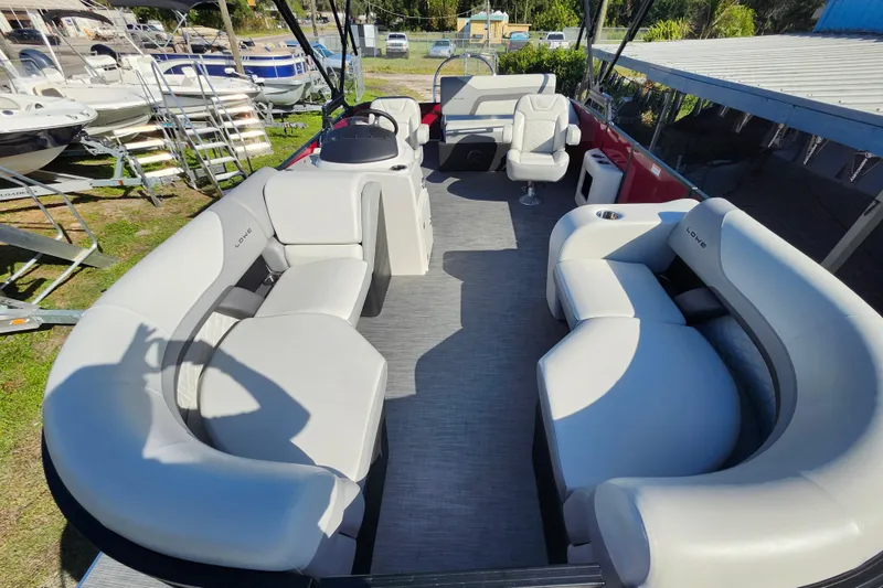 Slide: The Image of 2026 Lowe SS 230 DV pontoon boat with spacious seating and modern design. - 8