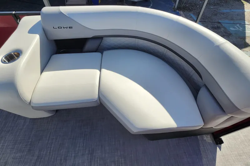 Slide: The Image of Luxurious seating on 2026 Lowe SS 230 DV pontoon boat, featuring elegant design and comfort. - 9
