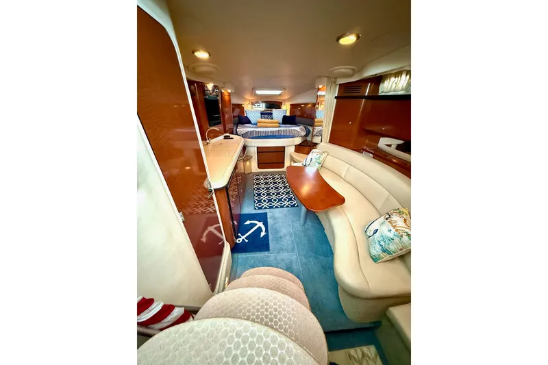 Slide: The Image of Luxurious interior of 2005 Sea Ray 340 Sundancer yacht with elegant seating and decor. - 21