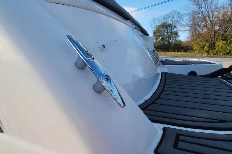 Slide: The Image of 2022 Bayliner VR6 Bowrider OB boat with sleek chrome cleat and black deck. - 15