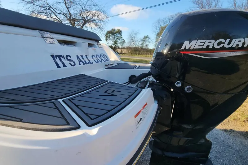 Slide: The Image of 2022 Bayliner VR6 Bowrider OB with Mercury outboard engine, rear view. - 17