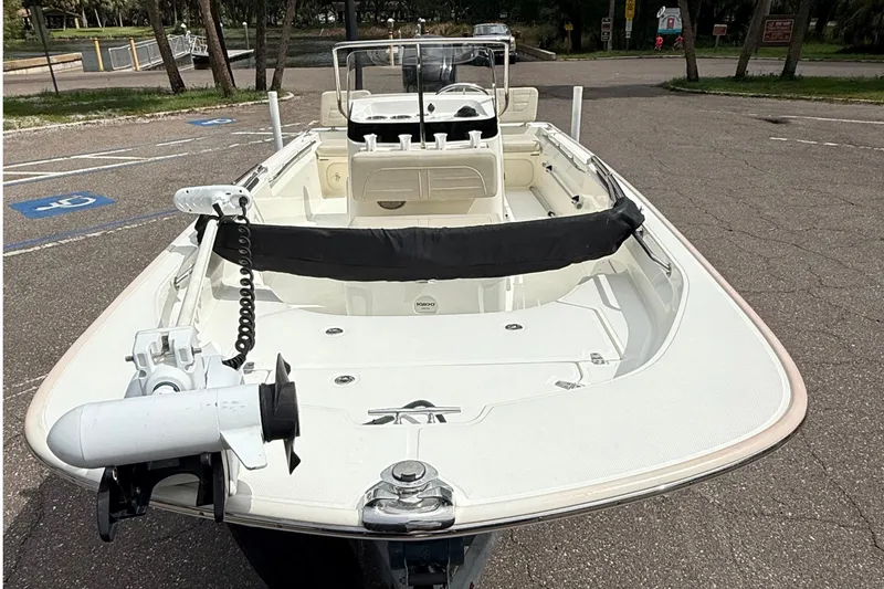 Slide: The Image of 2021 Boston Whaler 170 Montauk boat parked in a lot, front view. - 14