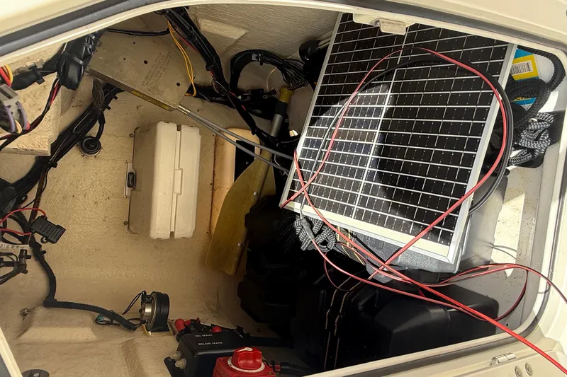 Slide: The Image of Interior of a 2021 Boston Whaler 170 Montauk with solar panel and wiring. - 25