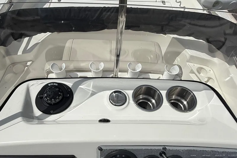 Slide: The Image of 2021 Boston Whaler 170 Montauk console with compass and cup holders. - 31