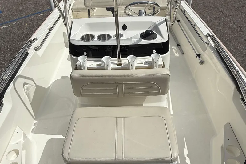 Slide: The Image of 2021 Boston Whaler 170 Montauk boat interior with steering console and seating. - 33