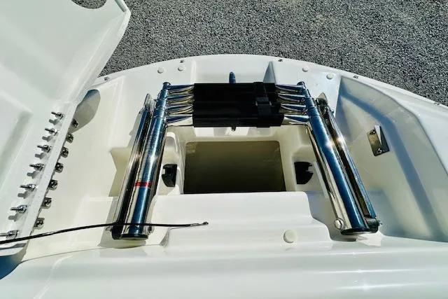 Slide: The Image of 2026 Sea Ray SPX 230 Outboard boat ladder and storage compartment. - 18