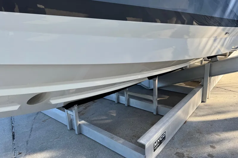 Slide: The Image of 2023 Formula 400 Super Sport Crossover boat on a trailer, side view. - 34