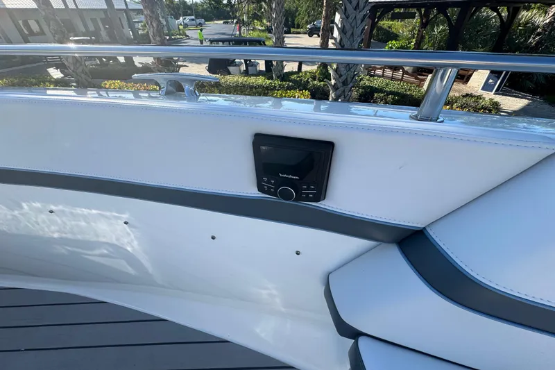 Slide: The Image of 2023 Formula 400 Super Sport Crossover boat interior with audio control panel. - 41