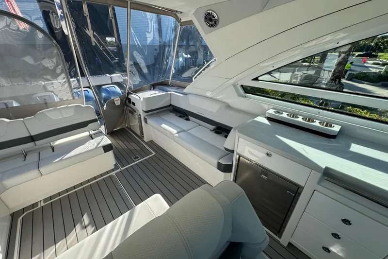 Slide: The Image of 2023 Formula 400 Super Sport Crossover interior with sleek seating and modern amenities. - 48