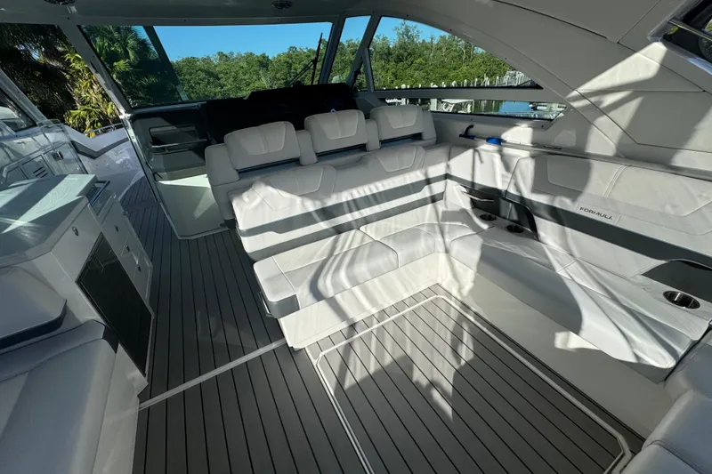 Slide: The Image of 2023 Formula 400 Super Sport Crossover interior with sleek white seating and modern design. - 53