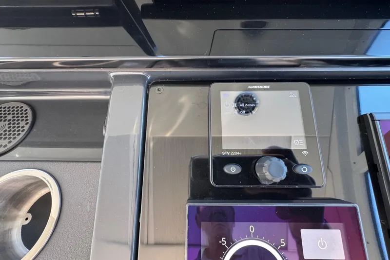 Slide: The Image of Control panel of 2023 Formula 400 Super Sport Crossover boat, featuring Lumishore display. - 58