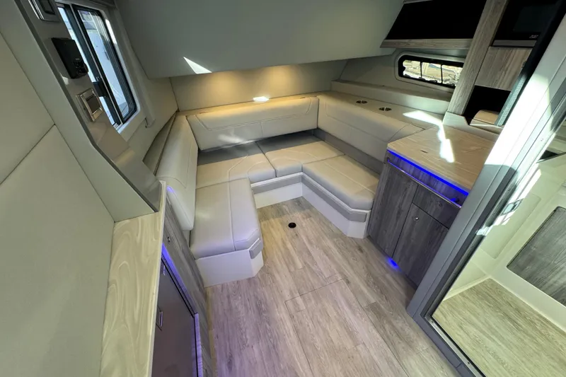 Slide: The Image of Luxurious interior of 2023 Formula 400 Super Sport Crossover with modern seating and ambient lighting. - 71