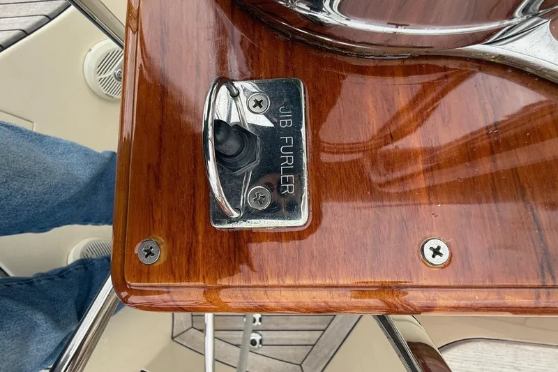 Slide: The Image of Jib furler control on 2015 Hinckley DS 42 yacht with polished wood finish. - 39