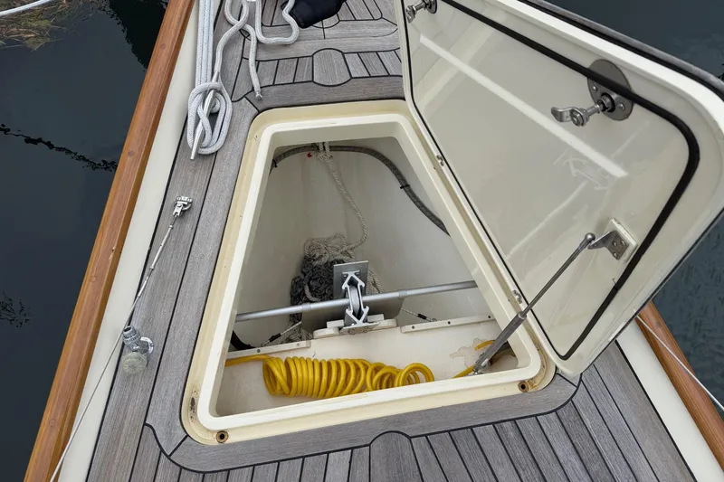Slide: The Image of Open hatch on 2015 Hinckley DS 42 boat deck, revealing storage compartment. - 20