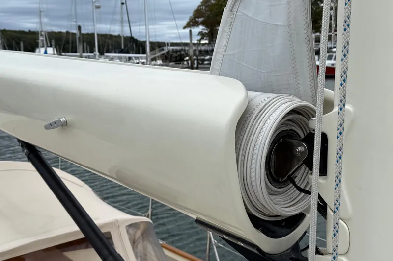 Slide: The Image of Close-up of a 2015 Hinckley DS 42 sailboat's furling system with rolled sail. - 30
