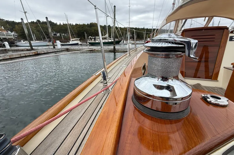 Slide: The Image of Hinckley DS 42 sailboat deck with winch, docked in a marina, 2015 model. - 38