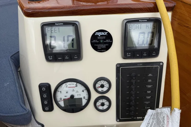Slide: The Image of Hinckley DS 42 2015 control panel with digital displays and gauges. - 43