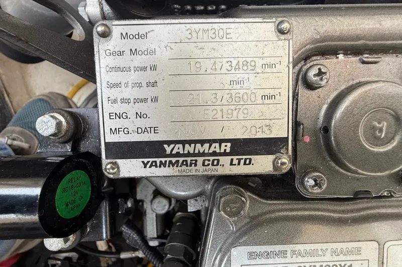 Slide: The Image of Yanmar engine plate on a 2015 Hinckley DS 42, showing specifications and manufacturing details. - 81