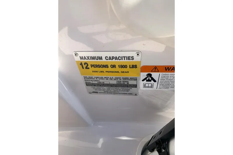 Slide: The Image of 2003 Four Winns 240 Horizon capacity label, maximum 12 persons or 1800 lbs. - 15
