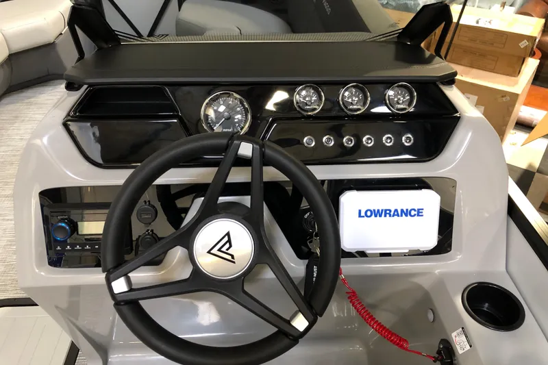 Slide: The Image of Steering console of 2026 Viaggio V22U boat with Lowrance display and modern controls. - 7