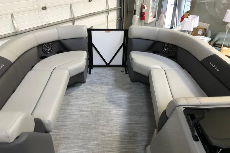 Slide: The Image of Luxurious interior of 2026 Viaggio V22U pontoon boat with plush seating and modern design. - 9
