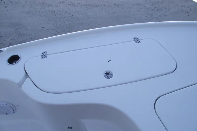 Slide: The Image of 2019 Sea Hunt BX 22 BR boat deck with storage compartment. - 11