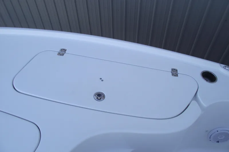 Slide: The Image of 2019 Sea Hunt BX 22 BR boat storage compartment with secure latch and hinges. - 13