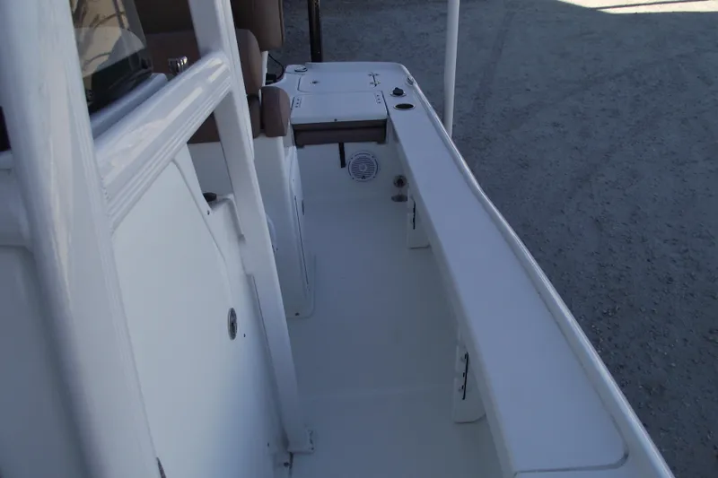 Slide: The Image of 2019 Sea Hunt BX 22 BR boat interior with seating and storage compartments. - 20