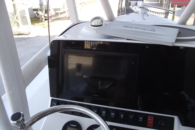 Slide: The Image of 2019 Sea Hunt BX 22 BR boat dashboard with Garmin navigation system. - 28