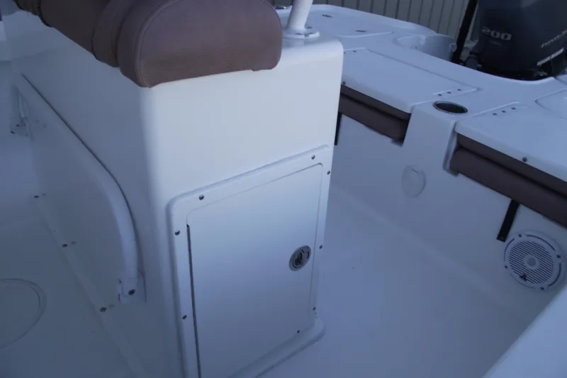 Slide: The Image of 2019 Sea Hunt BX 22 BR boat interior with seating and storage compartments. - 32