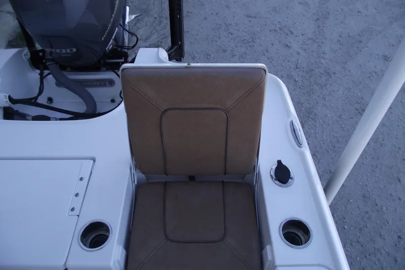 Slide: The Image of 2019 Sea Hunt BX 22 BR boat seat with cup holders and motor view. - 42