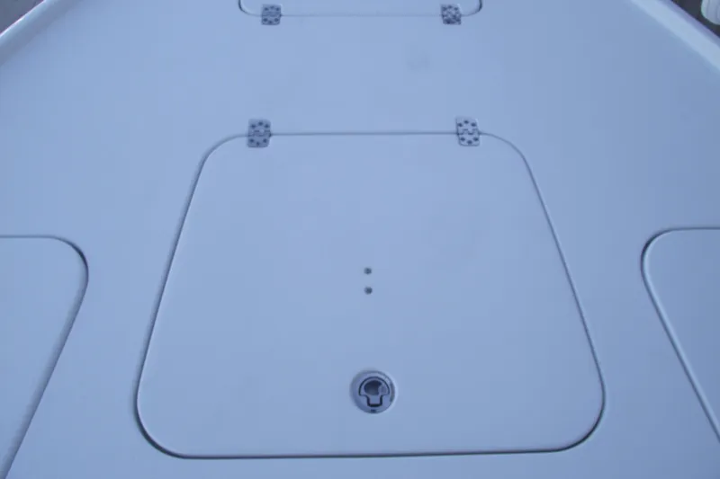 Slide: The Image of Hatch cover on 2019 Sea Hunt BX 22 BR boat deck. - 9