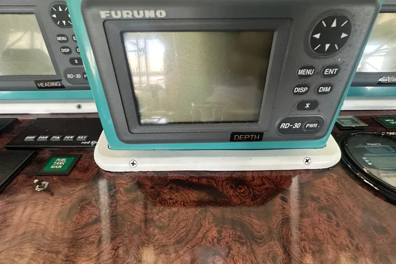 Slide: The Image of Furuno RD-30 depth display on 1972 Tollycraft 42 Tri-Cabin dashboard. - 21