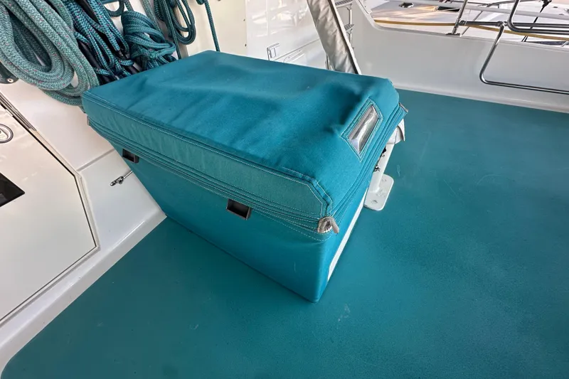 Slide: The Image of Teal-covered equipment on 1972 Tollycraft 42 Tri-Cabin boat deck. - 23