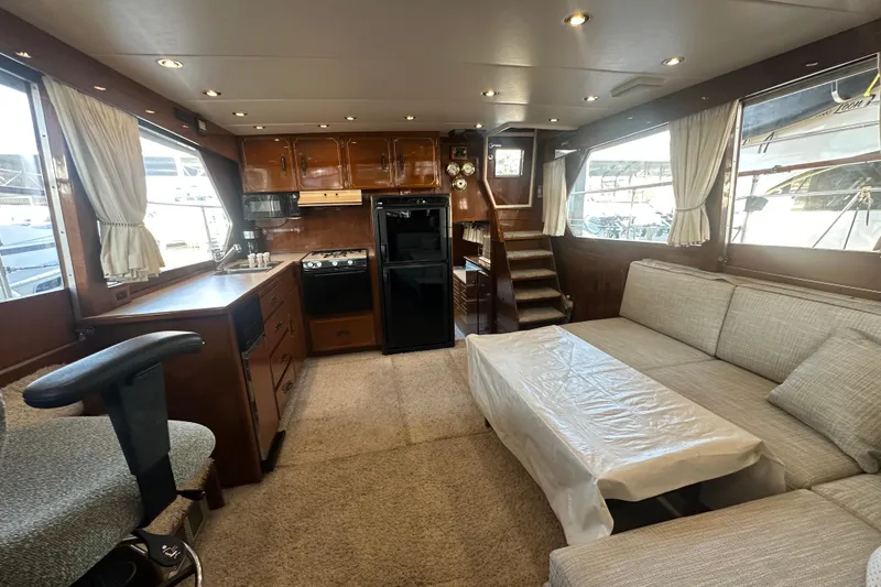 Slide: The Image of Interior of 1972 Tollycraft 42 Tri-Cabin yacht with kitchen and seating area. - 41
