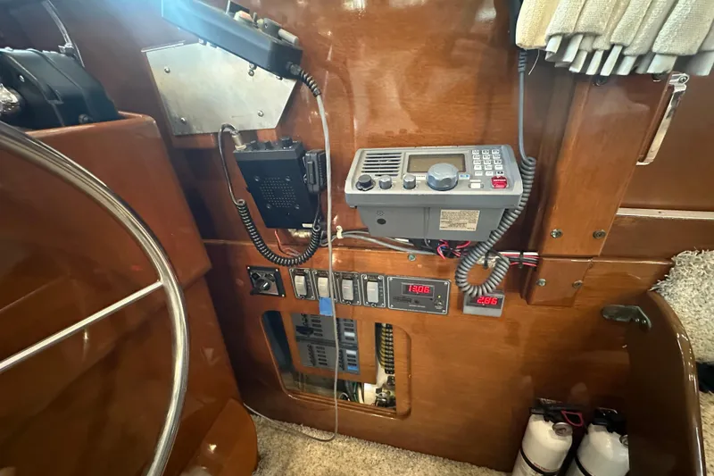Slide: The Image of Interior view of a 1972 Tollycraft 42 Tri-Cabin with radio and control panel. - 47