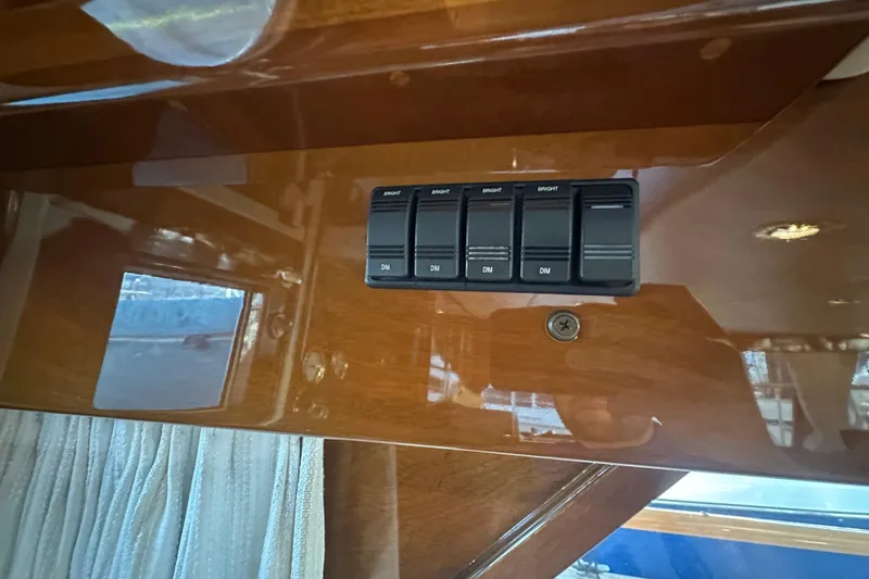 Slide: The Image of Control panel on 1972 Tollycraft 42 Tri-Cabin yacht with wooden interior finish. - 48