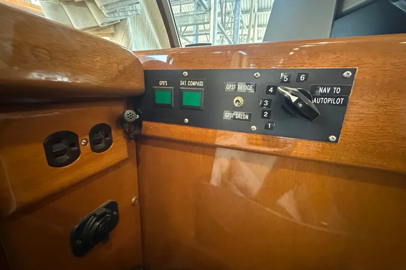 Slide: The Image of Control panel of a 1972 Tollycraft 42 Tri-Cabin boat with navigation switches. - 49