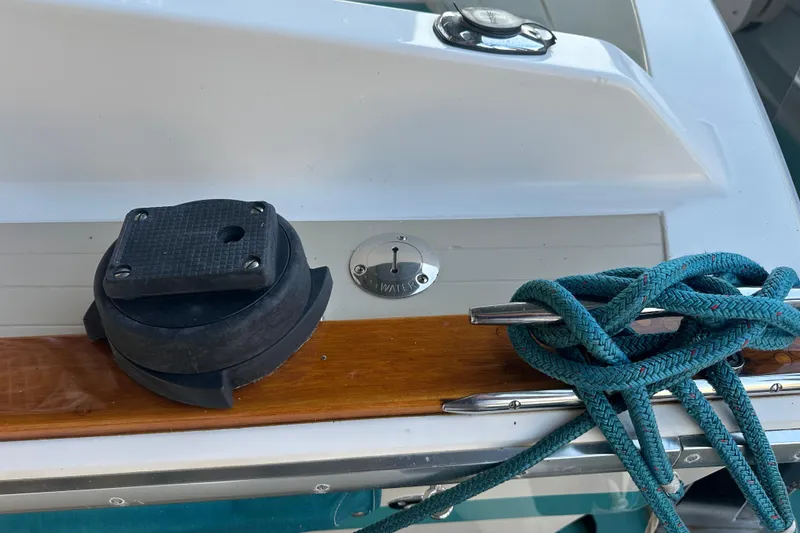 Slide: The Image of 1972 Tollycraft 42 Tri-Cabin deck with cleat, rope, and hardware details. - 8