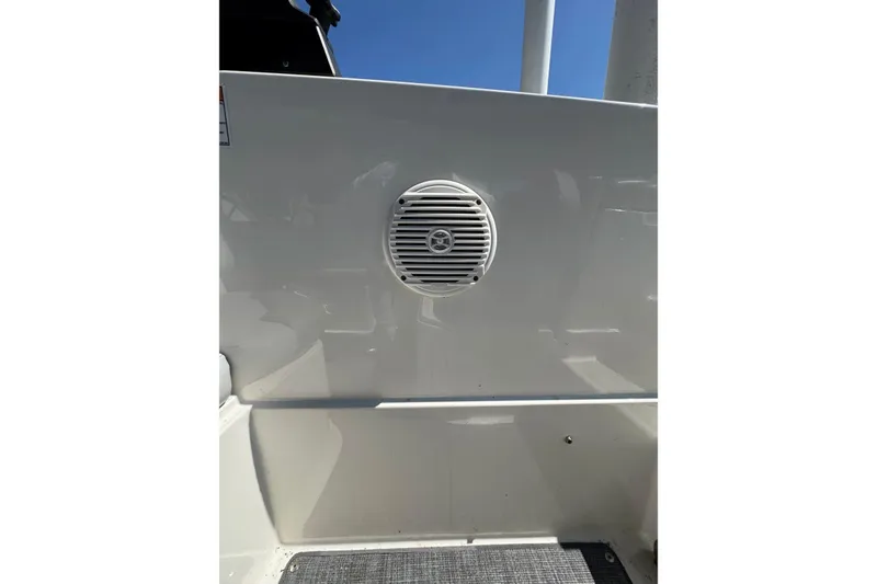 Slide: The Image of 2022 Bayliner VR6 Bowrider OB boat speaker on white panel under blue sky. - 15