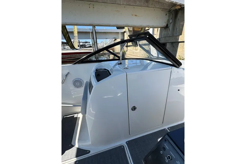 Slide: The Image of 2022 Bayliner VR6 Bowrider OB interior with sleek design and modern features. - 16